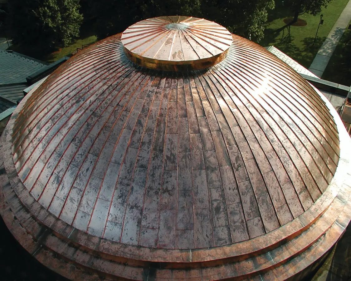 Craftsman Roofing crew installing a new roof in East Troy